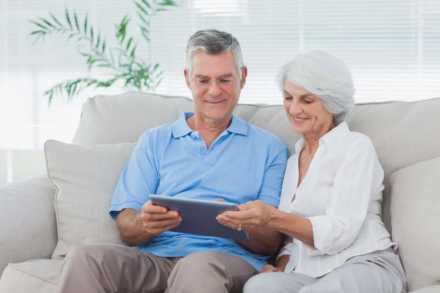 A couple going over Medicare details together at home
